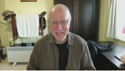 A person wearing glasses

Description automatically generated with low confidence